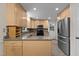 Kitchen featuring granite countertops, stainless steel appliances, and ample cabinet space at 2501 Huntsman Trl, Zebulon, NC 27597
