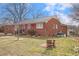 A lovely single story brick home with mature trees and established landscaping at 2503 Mckinney St, Burlington, NC 27217