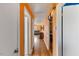 Hallway features hardwood floors with multiple doorways leading to other rooms at 2503 Mckinney St, Burlington, NC 27217