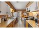Kitchen showcasing stainless steel appliances and ample cabinet space at 2503 Mckinney St, Burlington, NC 27217