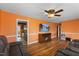 Inviting living room featuring hardwood floors, open entryway to other rooms and modern furniture at 2503 Mckinney St, Burlington, NC 27217