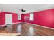 Bright living room with hardwood floors and a ceiling fan at 2503 Mckinney St, Burlington, NC 27217