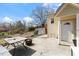 Cozy patio with outdoor dining space and fire pit, perfect for entertaining guests at 2503 Mckinney St, Burlington, NC 27217