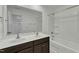 Modern bathroom featuring double sinks and a shower-tub combination for added convenience at 2728 Spring Valley Dr, Creedmoor, NC 27522