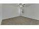 Bright, carpeted bedroom featuring a modern ceiling fan and natural light at 2728 Spring Valley Dr, Creedmoor, NC 27522
