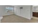 Bright bedroom with large window and modern bathroom access, offering comfort and convenience at 2728 Spring Valley Dr, Creedmoor, NC 27522