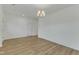 Clean living room featuring pristine white walls, modern flooring, and neutral decor at 2728 Spring Valley Dr, Creedmoor, NC 27522