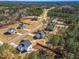 Aerial shot highlighting homesites in a wooded neighborhood, illustrating the community's serene and spacious setting at 286 Beacon Hill Rd, Lillington, NC 27546