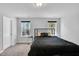 Cozy bedroom with natural light, plush carpeting, and a tranquil atmosphere at 286 Beacon Hill Rd, Lillington, NC 27546