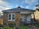 Quaint stone-accented bungalow with a cozy front porch at 306 Martin Luther King Jr Dr, Smithfield, NC 27577