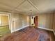 Living room with wood floor and vintage chandelier at 306 Martin Luther King Jr Dr, Smithfield, NC 27577