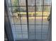 View of the wood back deck through sliding glass doors, providing access to outdoor relaxation at 321 Duke Memorial Road, Louisburg, NC 27549