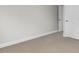 Bedroom featuring neutral carpet and white trim, highlighting the room's clean design at 329 Umstead St, Sanford, NC 27330