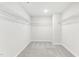 Spacious walk-in closet with wire shelving for optimal storage and organization solutions at 3405 Rosebush Dr, Zebulon, NC 27597