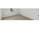 Unfurnished bedroom with neutral carpet, a window and white walls at 36 Sweet Meadow Rd, Angier, NC 27501