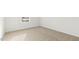 Carpeted bedroom with a window and plenty of natural light at 36 Sweet Meadow Rd, Angier, NC 27501