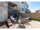 Inviting outdoor patio with comfortable seating, brick pavers, and serene backyard views at 4108 Overcup Oak Ln, Cary, NC 27519