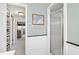 Bathroom with a shower, hooks for towels, and light green walls at 4209 Converse Dr, Raleigh, NC 27609