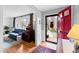 View from open front door to living room with hardwood floors and stylish decor at 4209 Converse Dr, Raleigh, NC 27609