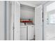 Laundry room featuring a washer and dryer neatly tucked behind bi-fold doors at 4209 Converse Dr, Raleigh, NC 27609