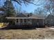 Charming single-Gathering home features a cozy covered porch and traditional architectural details at 425 S Mercer St, Rocky Mount, NC 27801