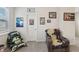 Relaxing bedroom featuring sports memorabilia wall art and comfortable seating at 440 Pierce Landing Dr, Garner, NC 27529