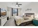 Bedroom featuring neutral decor, ceiling fan, and an abundance of natural light at 440 Pierce Landing Dr, Garner, NC 27529