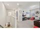 Bright bonus room with carpet flooring, TV, and a ' slide, perfect for entertaining at 440 Pierce Landing Dr, Garner, NC 27529