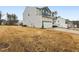 Charming two-story home with a welcoming front porch and a well-manicured lawn at 440 Pierce Landing Dr, Garner, NC 27529
