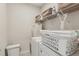 Bright laundry room featuring shelving, a washing machine, and plenty of space at 440 Pierce Landing Dr, Garner, NC 27529