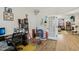 Office with french doors leading to the living space with a decorative garage and a black bookshelf at 440 Pierce Landing Dr, Garner, NC 27529