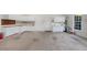 Spacious garage features white cabinets and large open area at 4405 Turnberry Cir, Durham, NC 27712