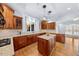 Well-appointed kitchen with custom cabinetry, granite countertops, and modern appliances at 4405 Turnberry Cir, Durham, NC 27712