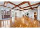 Spacious living room with hardwood floors, staircase, and natural light throughout at 4405 Turnberry Cir, Durham, NC 27712