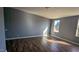 This bedroom features beautiful vinyl floors, neutral paint, and plenty of natural light at 4600 Strawbush Rd, Spring Hope, NC 27882