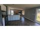 Bright kitchen with granite countertops, white cabinets, and sleek appliances at 4600 Strawbush Rd, Spring Hope, NC 27882
