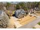 Aerial view of a home showcasing its well-manicured lawn and landscaping on a sunny day at 4773 Swordfish Dr, Raleigh, NC 27603