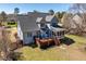 Charming home featuring a spacious wooden deck and screened-in porch, perfect for outdoor relaxation and entertaining at 4773 Swordfish Dr, Raleigh, NC 27603