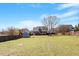 Large, well-maintained backyard with a shed, deck, and ample space for recreation at 4773 Swordfish Dr, Raleigh, NC 27603