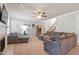 Inviting living room with a cozy fireplace and comfortable seating area, perfect for relaxation and entertaining at 4773 Swordfish Dr, Raleigh, NC 27603