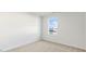 Bedroom featuring a window with natural light and neutral carpeting at 50 Sweet Meadow Rd, Angier, NC 27501