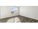 Bedroom featuring a window with natural light and neutral carpeting at 50 Sweet Meadow Rd, Angier, NC 27501