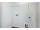Minimalist laundry room with white walls, utility hookups, and shelving storage at 50 Sweet Meadow Rd, Angier, NC 27501
