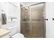 A cozy bathroom featuring a toilet and stand-up shower at 5013 Kristie Ln, Nashville, NC 27856