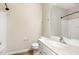 Functional bathroom with a single sink vanity, white fixtures and shower/tub combo at 7213 Terregles Dr, Raleigh, NC 27617