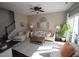 Cozy living room features stylish decor, neutral color palette, and lots of natural light at 7213 Terregles Dr, Raleigh, NC 27617