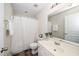 Bright bathroom with shower and tub combination, featuring a single sink vanity and neutral tones at 7753 Winners Edge St, Raleigh, NC 27617