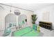 Home gym featuring large mirrors, rubber mats, yoga mats, and weight rack at 7753 Winners Edge St, Raleigh, NC 27617