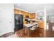 Well-equipped kitchen with stainless steel appliances and hardwood floors at 7753 Winners Edge St, Raleigh, NC 27617