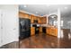 Modern kitchen with stainless steel appliances and hardwood floors at 7753 Winners Edge St, Raleigh, NC 27617